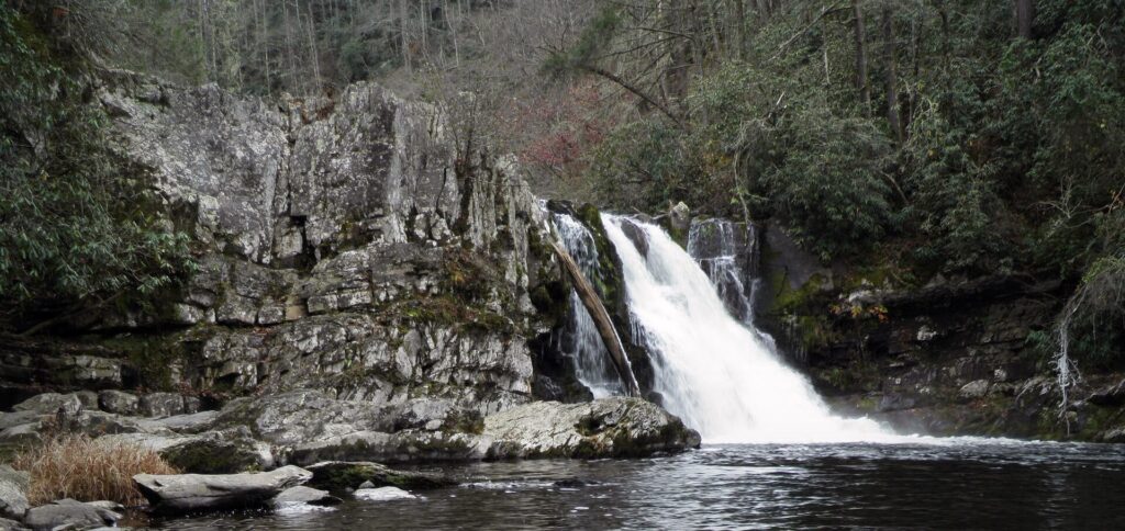 Abrams Falls in winter in Great Smoky Mountains National Park, water dropping into a wide plunge pool