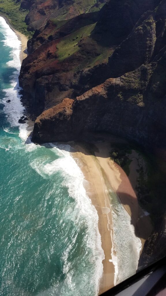 Aerial view of a Na Pali beach under the cliffs