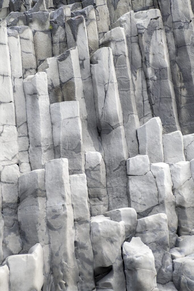 Close-up of hexagonal basalt columns in volcanic rock