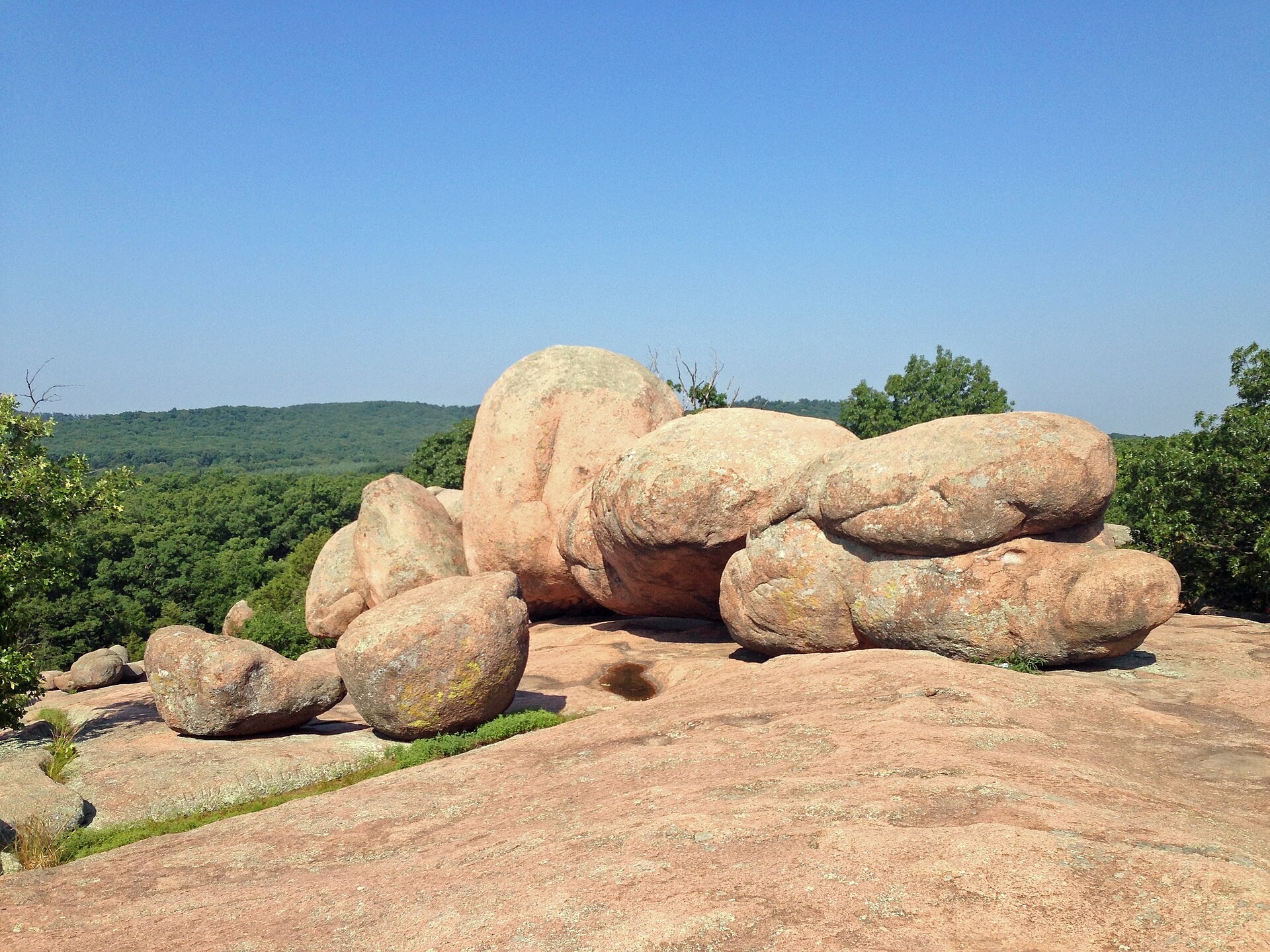 Rounded pink granite boulders stacked into a formation at Elephant Rocks State Park, Missouri