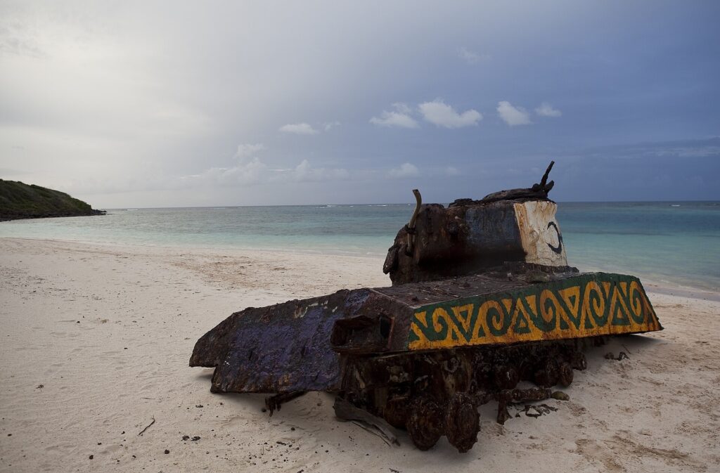 One of the rusted, graffiti-covered military tanks left on the sand at Flamenco Beach, Culebra
