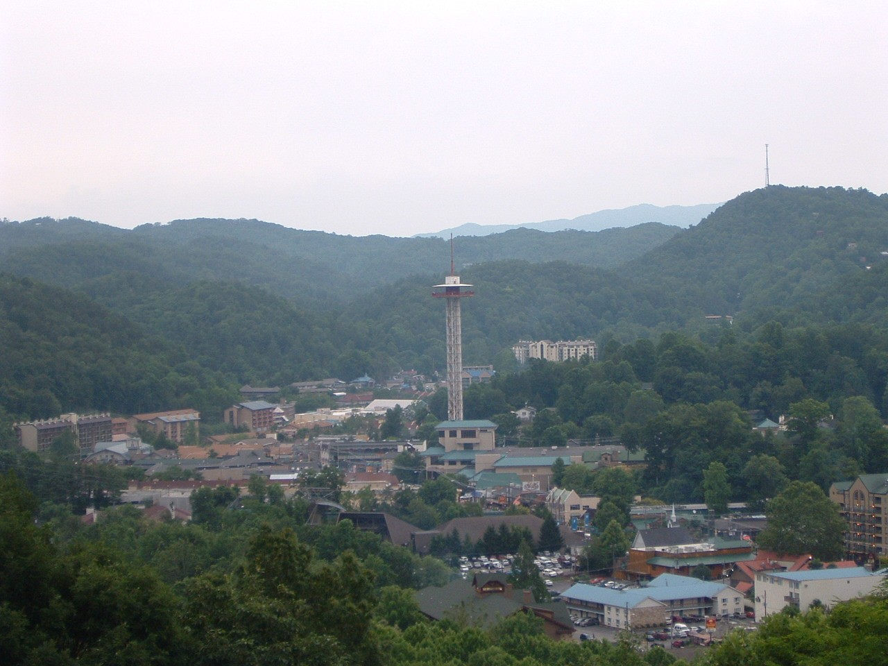 Downtown Gatlinburg, Tennessee along the Parkway with shops and mountains behind