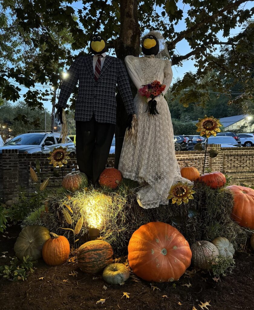 Scarecrow fall decorations outside shops at the Village in Gatlinburg, Tennessee