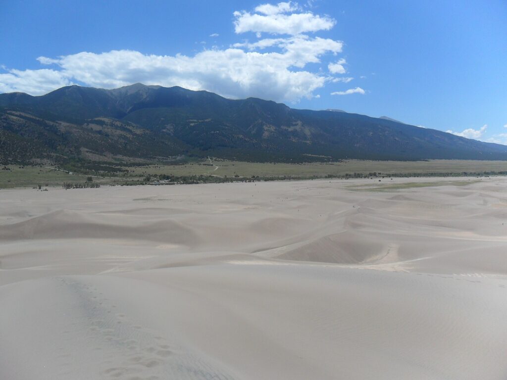Sand dunes at Great Sand Dunes National Park, Colorado, with the Sangre de Cristo Mountains behind