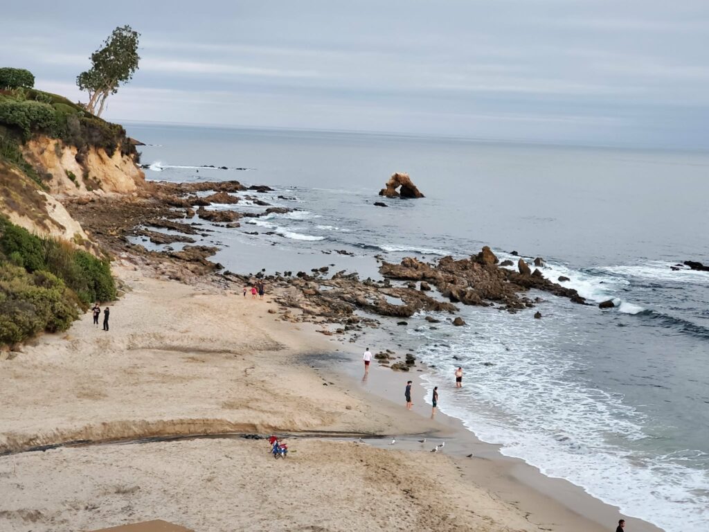 Arch rock offshore and the tide-pool reef at Little Corona Beach, Corona del Mar
