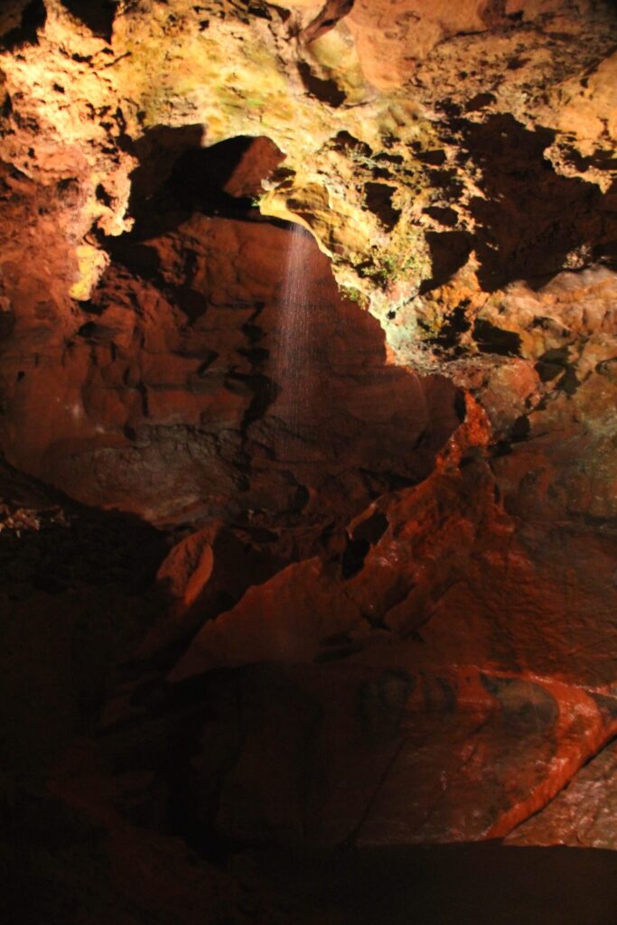 Underground waterfall and rock formations inside The Lost Sea cave in Sweetwater, Tennessee