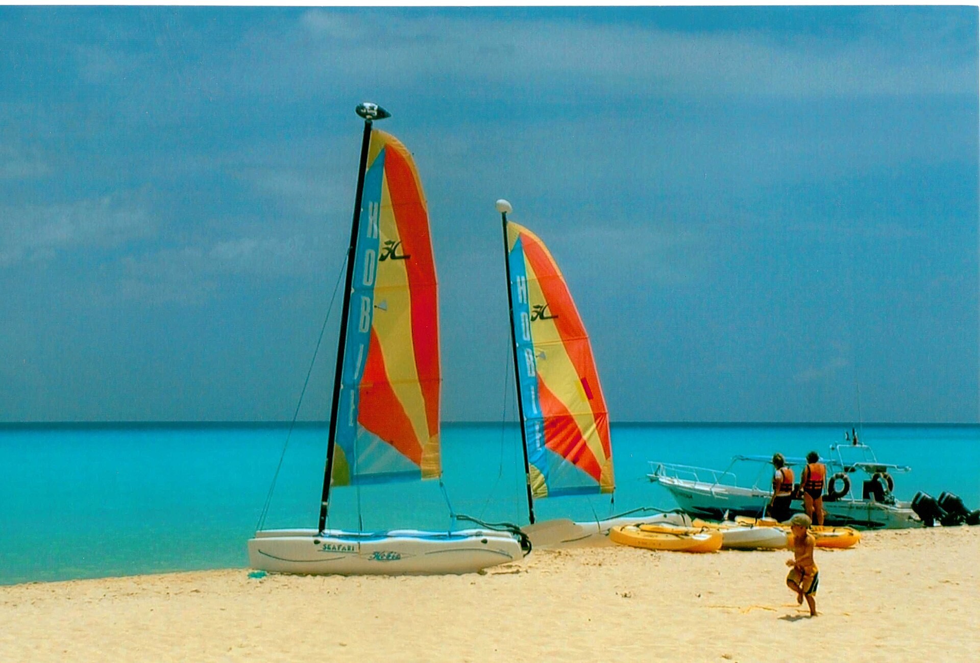 A wide sand beach with turquoise water in Playa del Carmen, Mexico