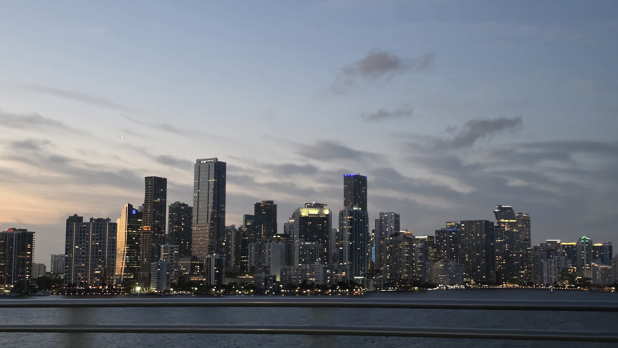 Downtown Miami skyline at dusk from the causeway