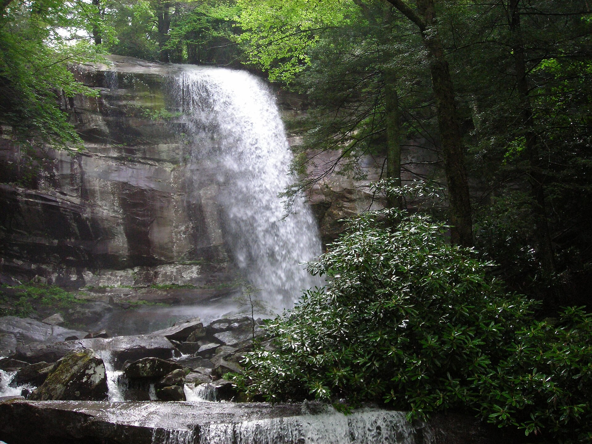 Rainbow Falls dropping over a rock ledge into a pool along the Rainbow Falls Trail below Mount LeConte