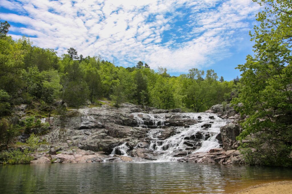 Rocky Falls tumbling over red shut-in rock at Ozark National Scenic Riverways