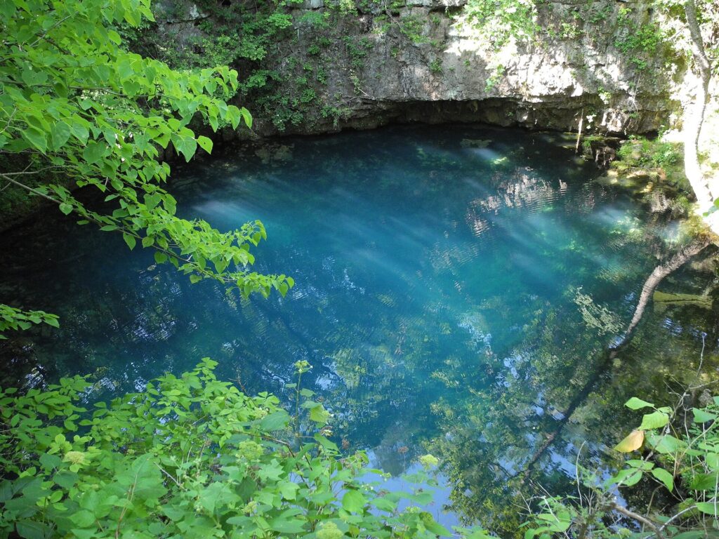 The deep turquoise pool of Round Spring near Eminence, Missouri