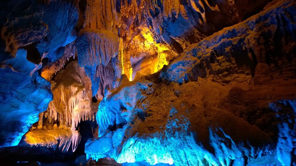Lit stalactite and stalagmite formations inside the Ruby Falls cave near Chattanooga