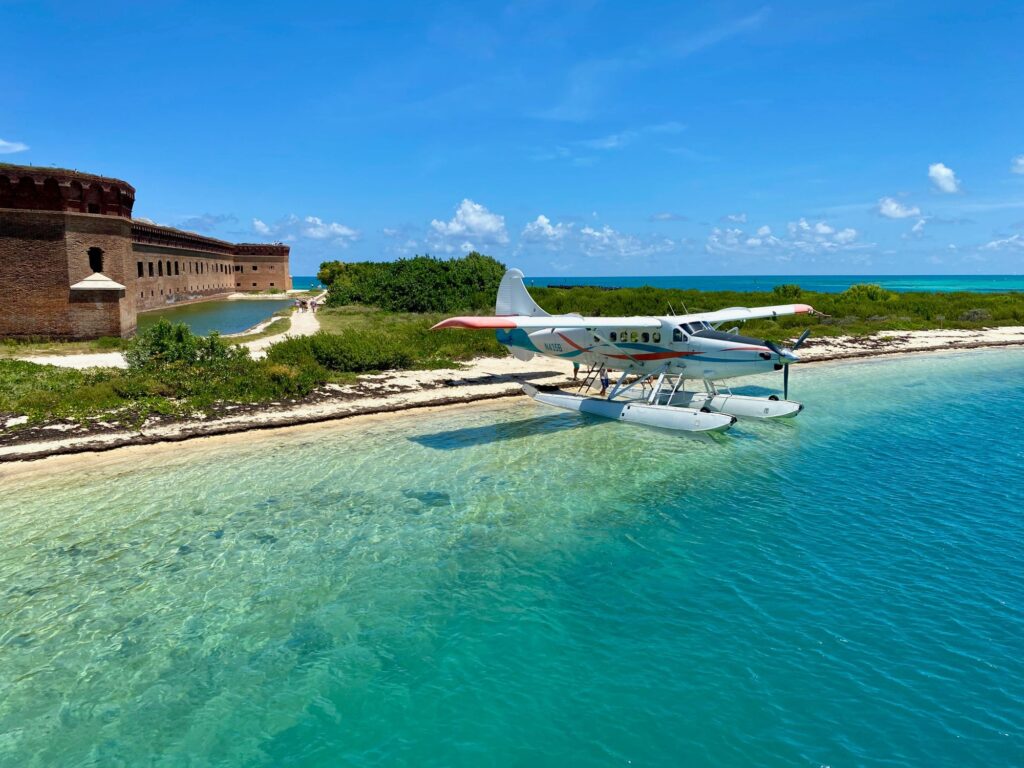 Seaplane pulled up on the beach beside Fort Jefferson, Dry Tortugas