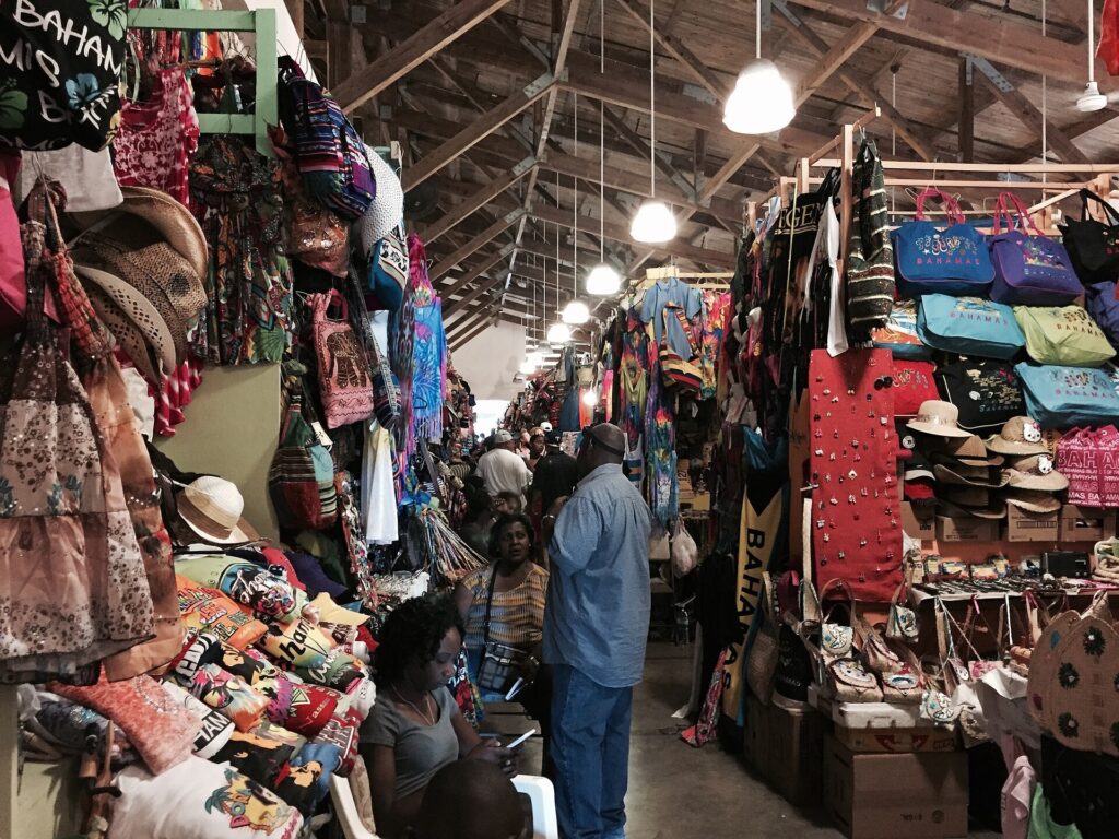 Vendor stalls under the covered roof of the Straw Market in downtown Nassau