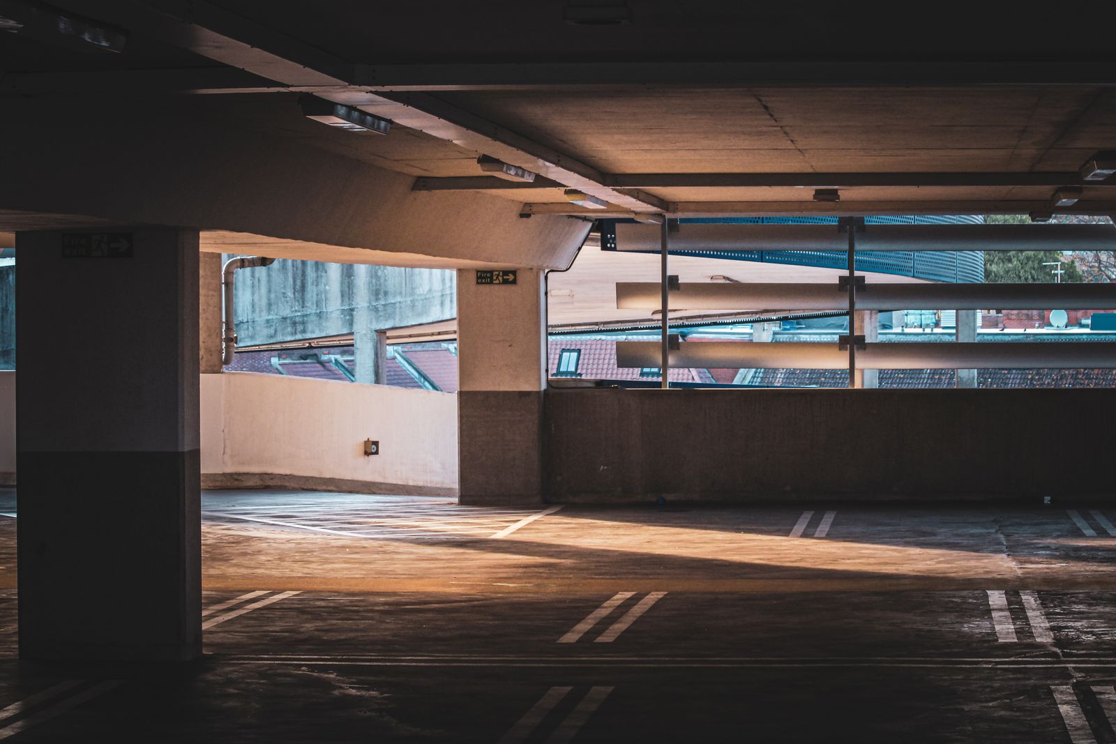 An empty multi-level parking garage with a spiral ramp