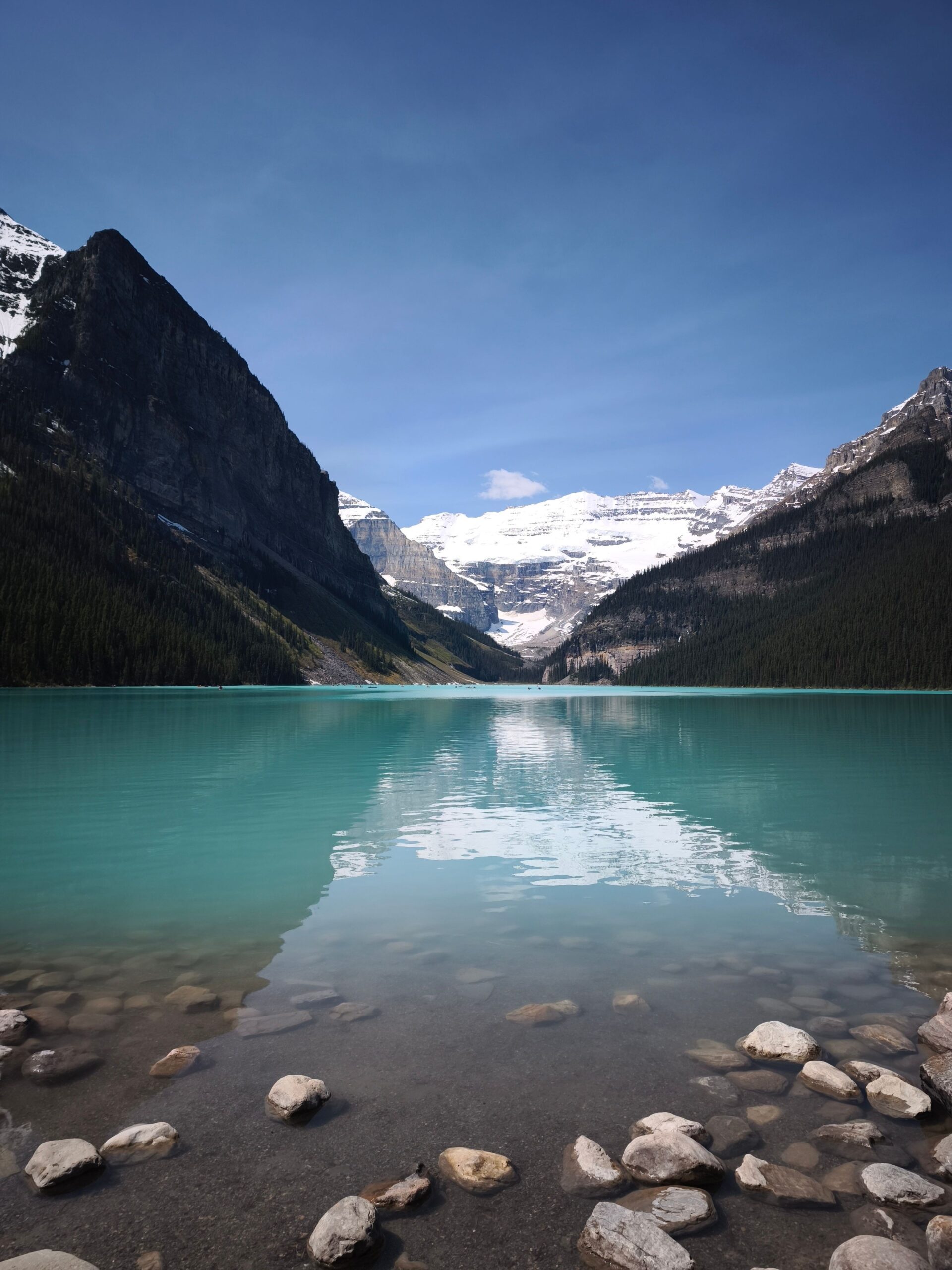 Turquoise water and mountain reflections at Lake Louise in Banff National Park