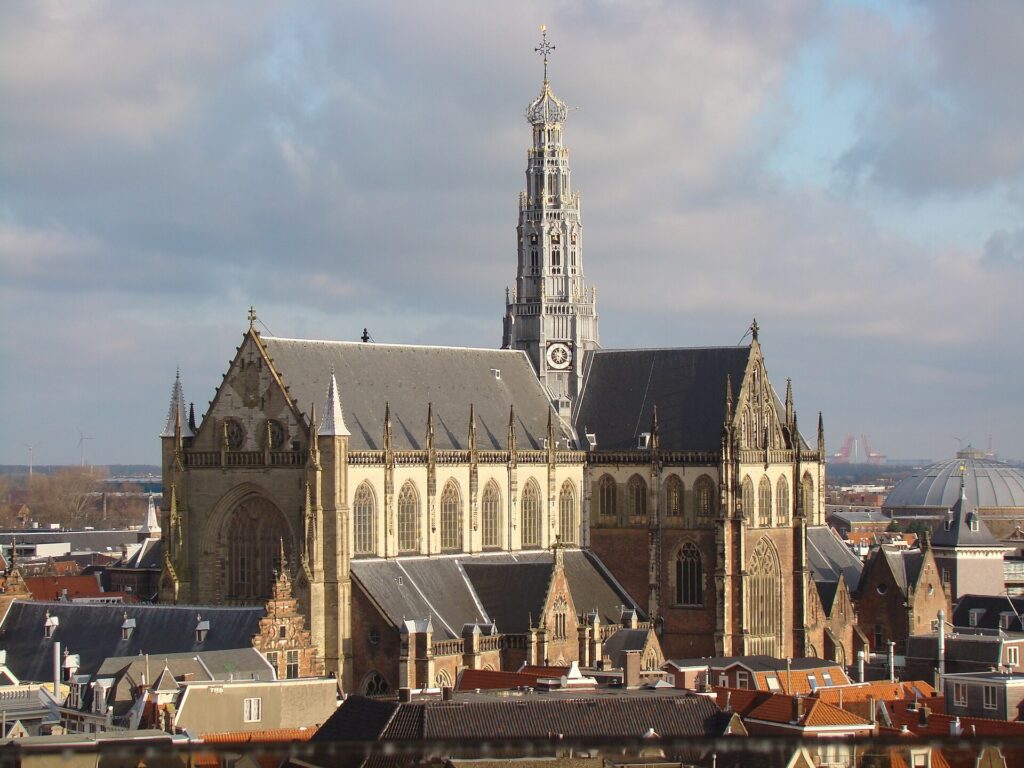 Tower of the Sint-Bavokerk church above the rooftops of Haarlem