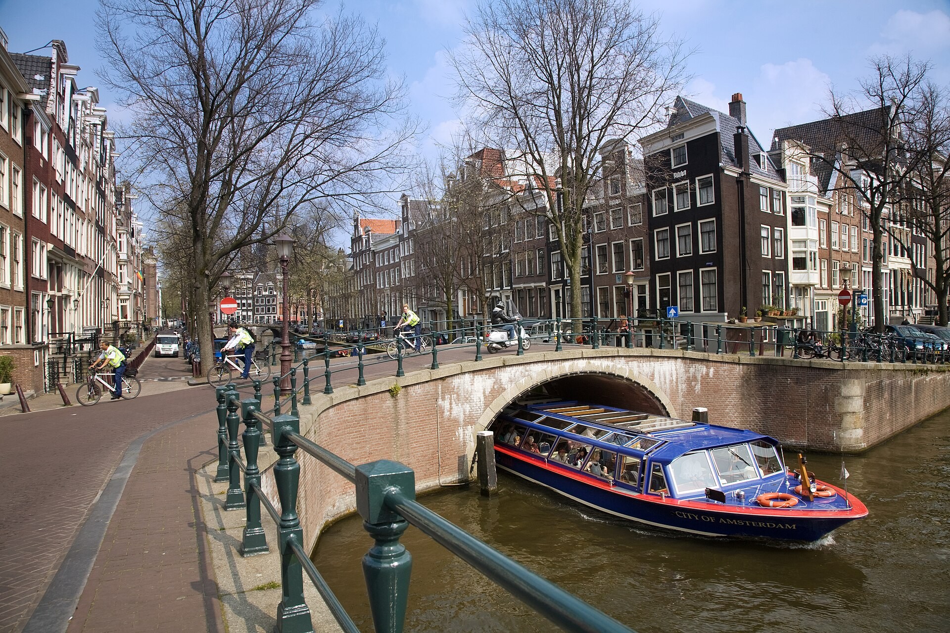Canal lined with trees and old houses on the Keizersgracht in Amsterdam