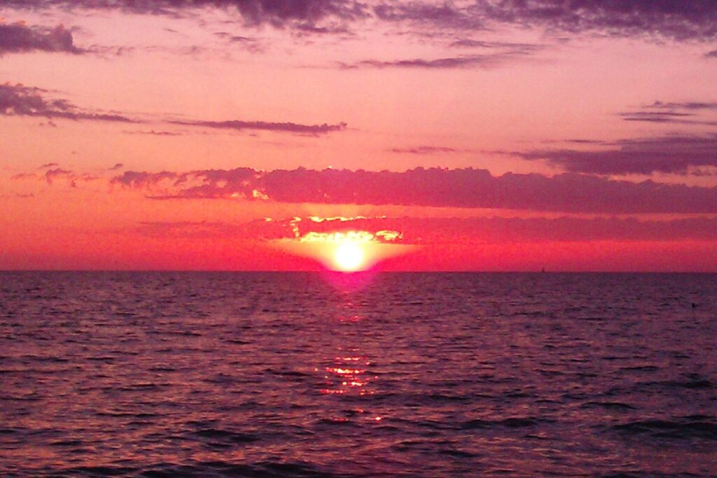 Red sunset over the Gulf of Mexico at Holmes Beach, Anna Maria Island