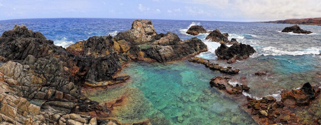 The Conchi natural pool ringed by rock on Aruba’s east coast
