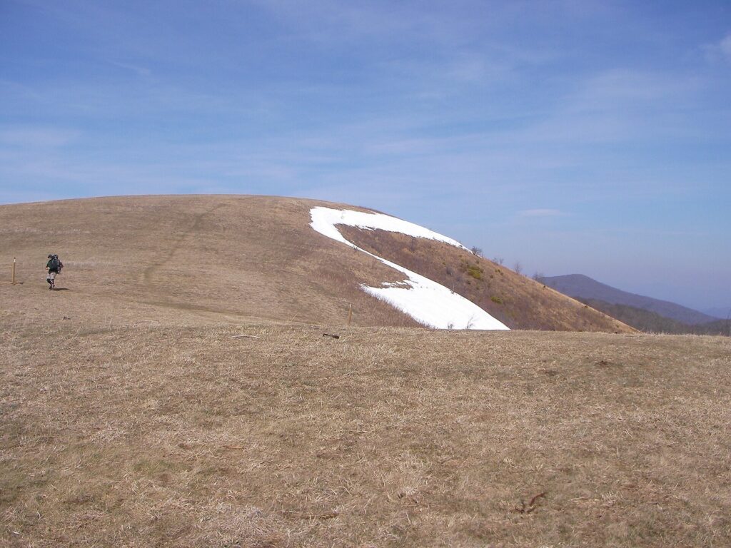 The Appalachian Trail crossing the grassy bald summit of Max Patch in western North Carolina