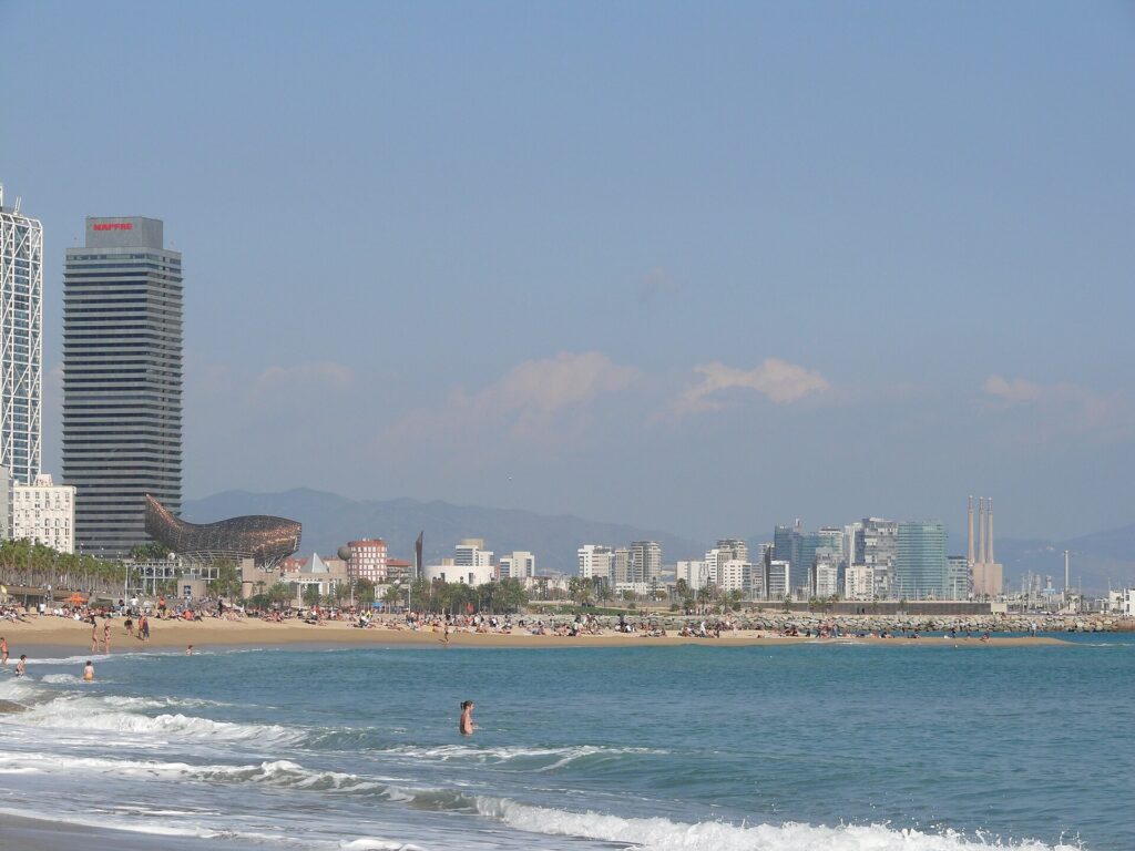 Sand and shoreline of Barceloneta beach in Barcelona