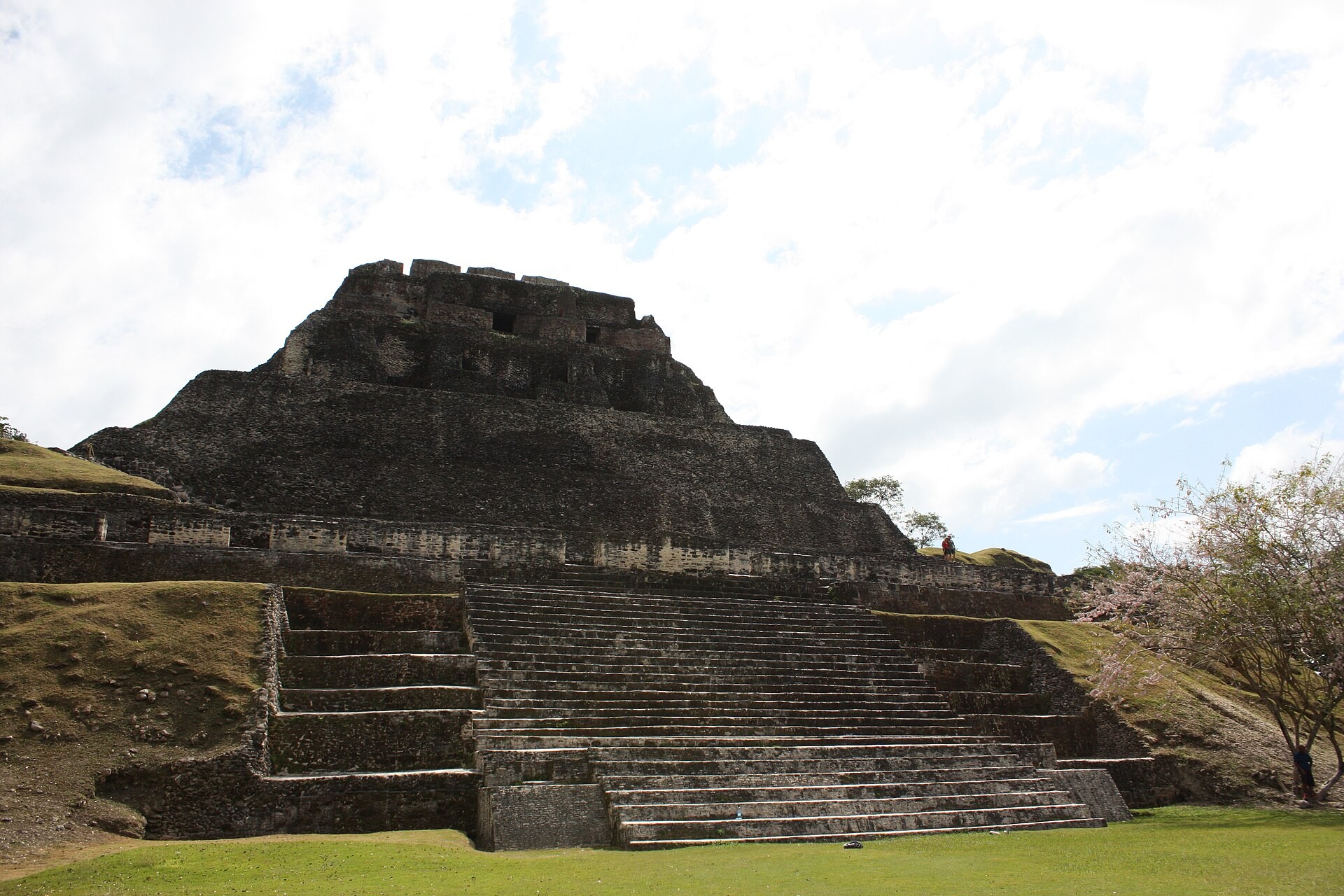 El Castillo pyramid rising above the plaza at Xunantunich, Belize