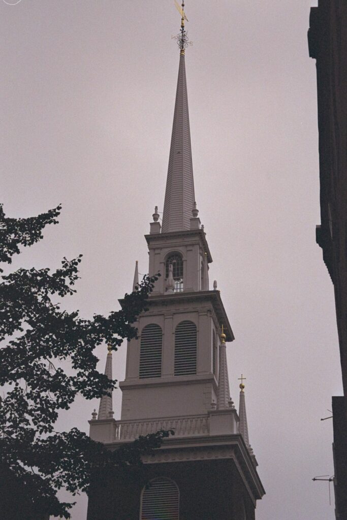 Old North Church steeple against a gray sky in Boston’s North End