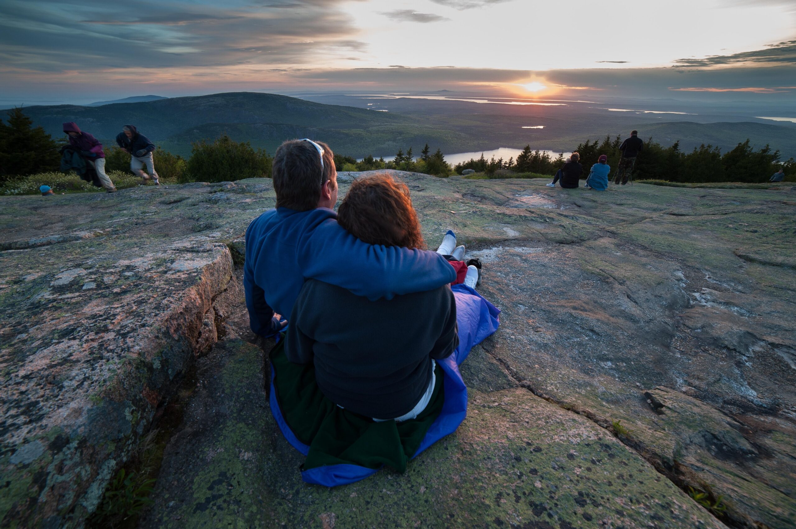Sunrise light over the granite summit of Cadillac Mountain in Acadia National Park