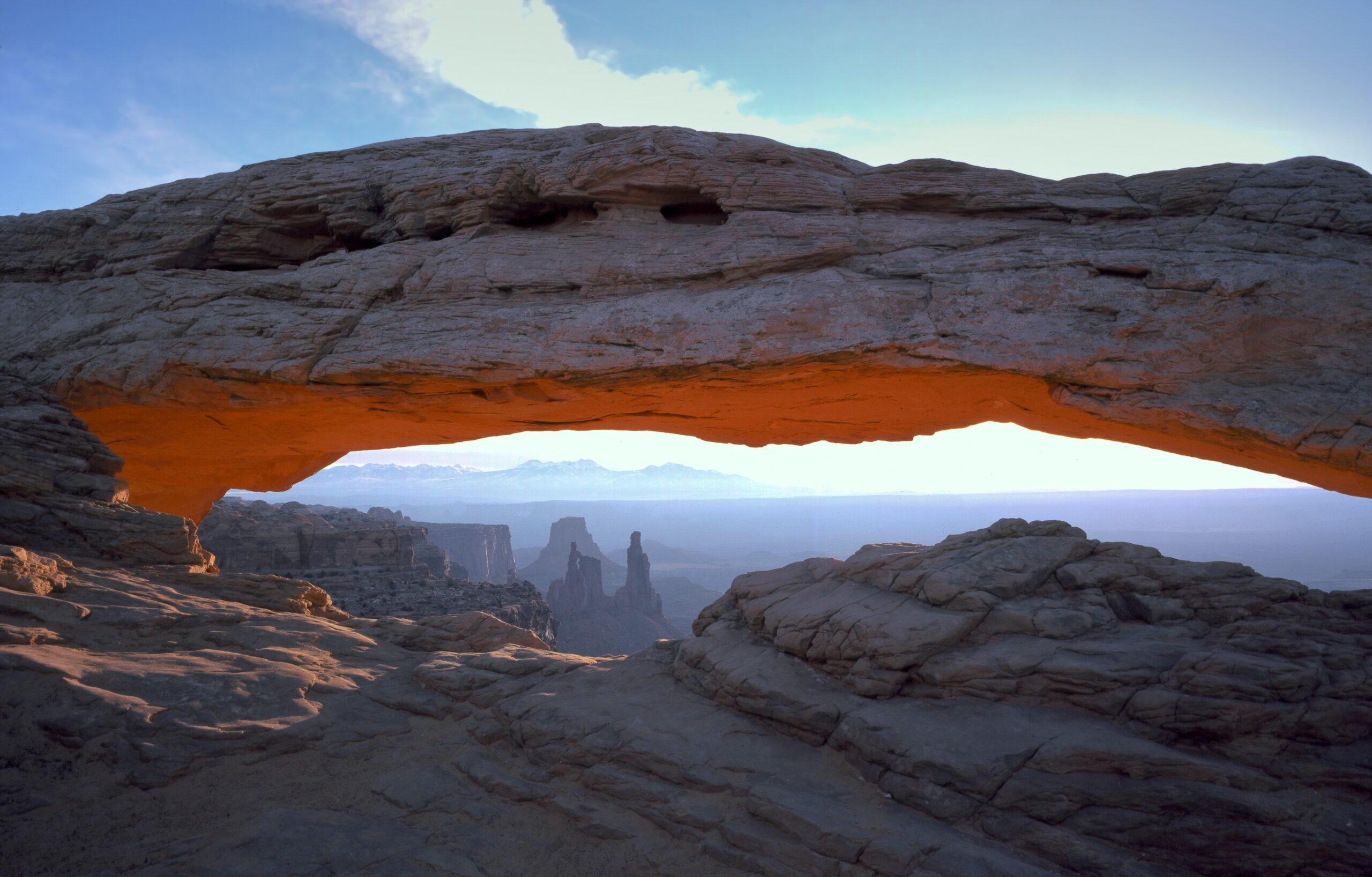 Mesa Arch framing the canyon country below at Island in the Sky, Canyonlands National Park
