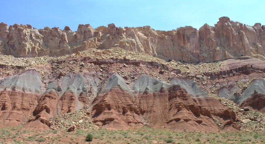 Sandstone cliffs rising above the Scenic Drive in Capitol Reef National Park, Utah