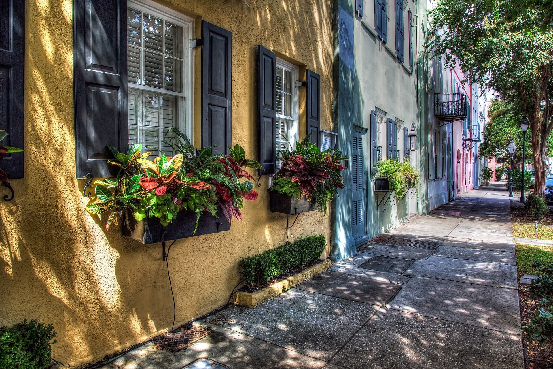 Pastel-colored row houses along East Bay Street in Charleston, South Carolina