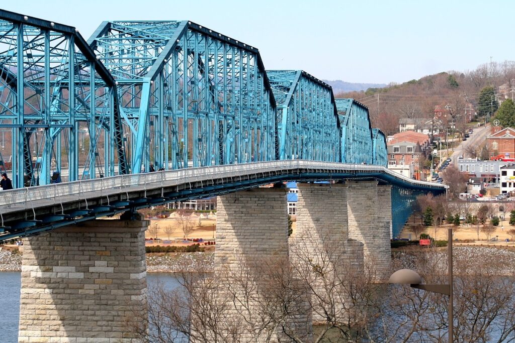 Blue steel trusses of the Walnut Street pedestrian bridge over the Tennessee River in Chattanooga