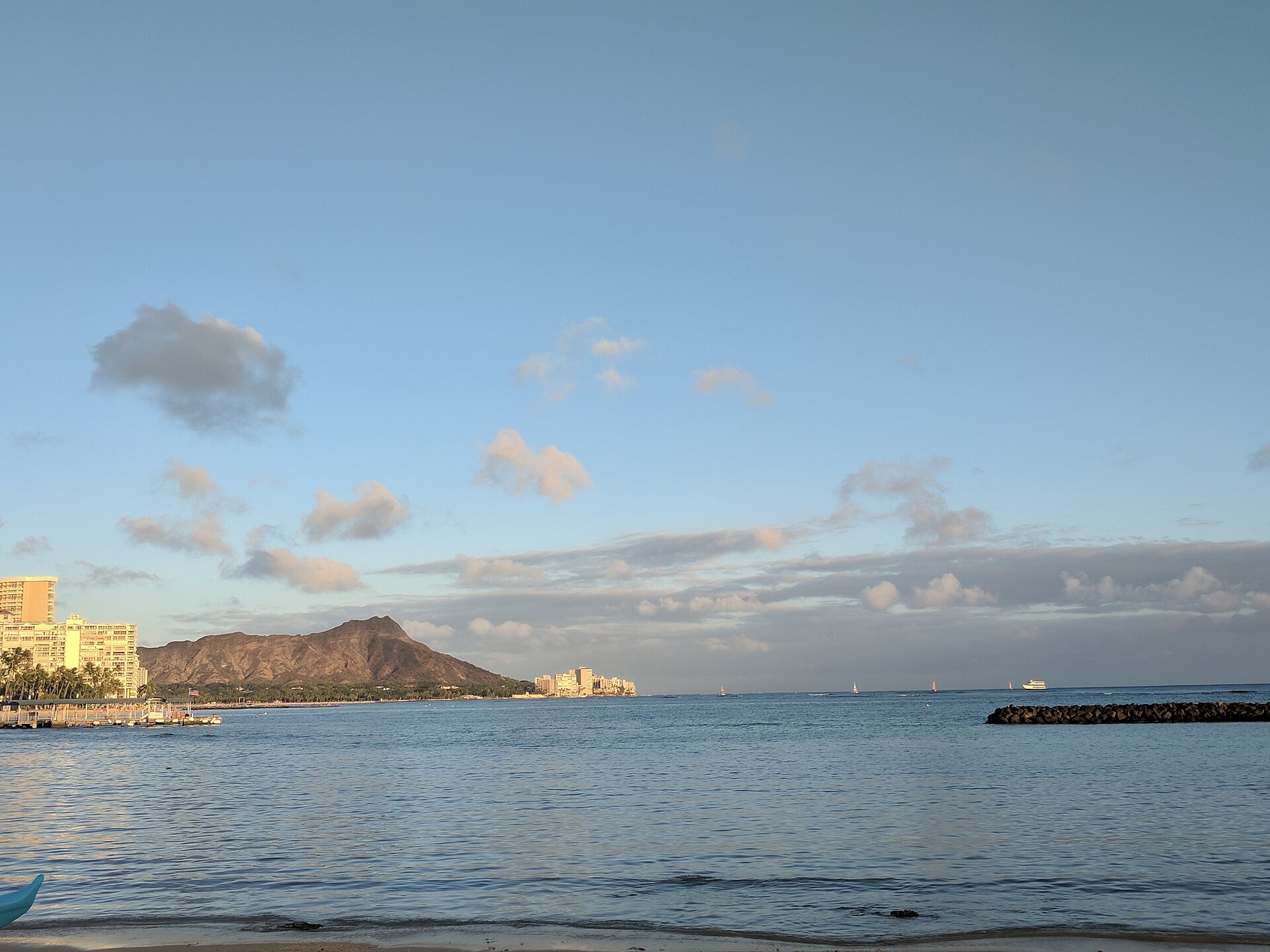 Diamond Head crater seen across the sand of Waikiki Beach on Oahu
