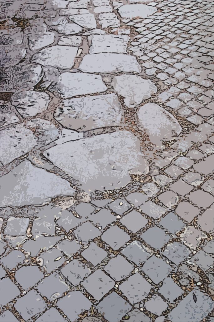 Worn paving stones and cobbles on the Via Appia Antica in Rome