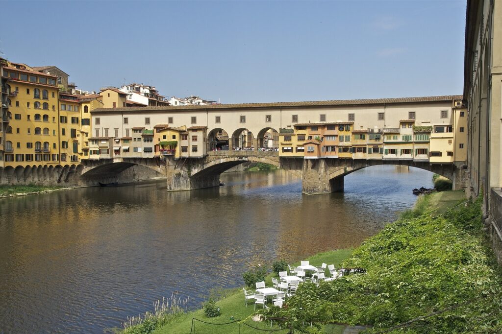 Ponte Vecchio and its shops crossing the Arno River in Florence