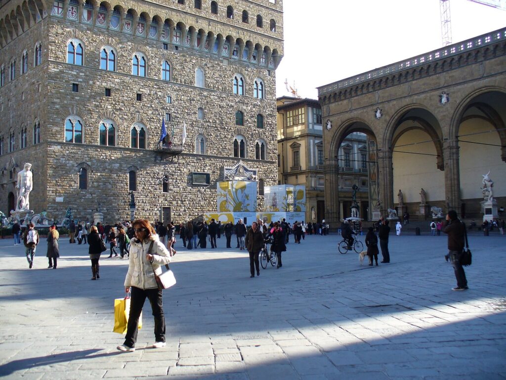 Palazzo Vecchio facade and the Loggia dei Lanzi on Piazza della Signoria in Florence