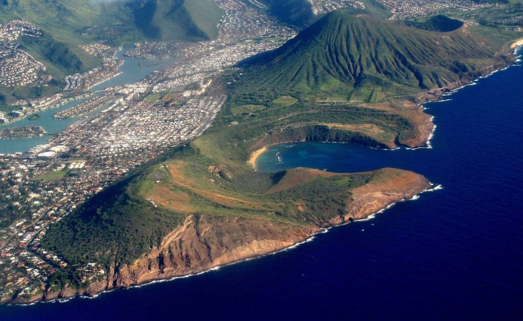 Aerial view of Hanauma Bay curving into a volcanic crater on the Oahu coast
