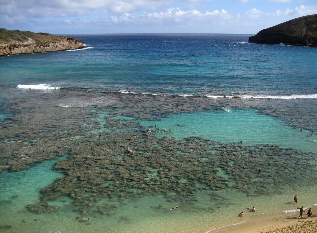 Hanauma Bay east of Honolulu on Oahu with the crescent-shaped beach and reef