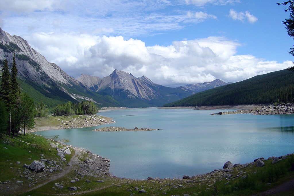 Medicine Lake with mountains beside the Maligne Lake Road in Jasper National Park