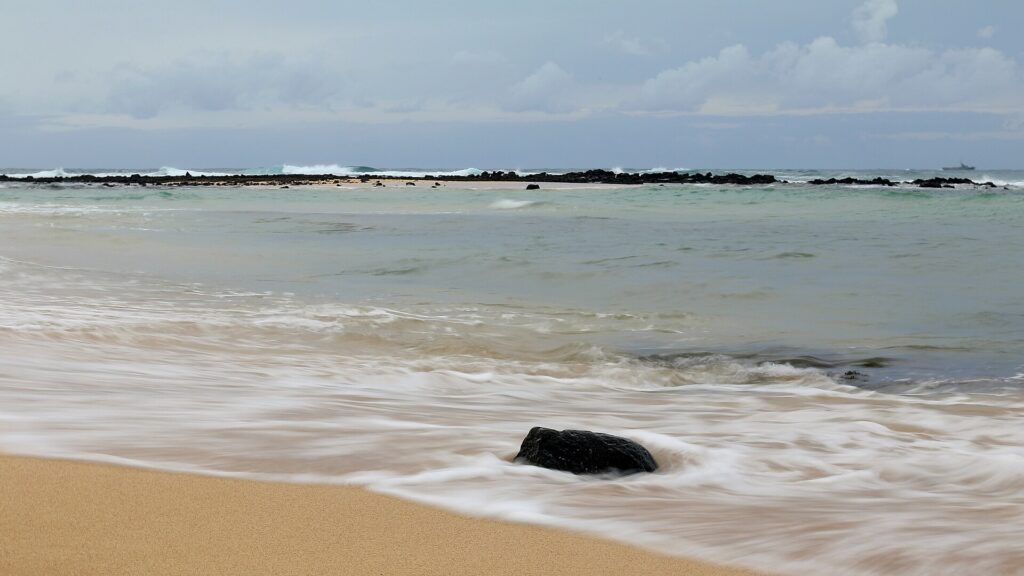 Poipu Beach Park on the south shore of Kauai with sand and ocean