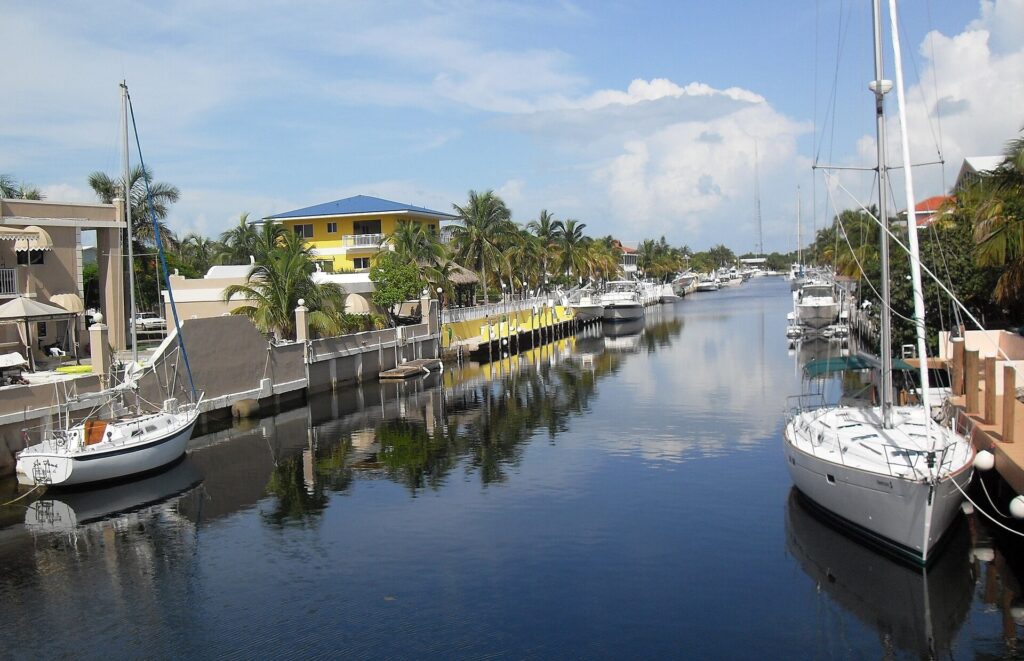 Canal lined with docks, boats and houses in the Key Largo harbor