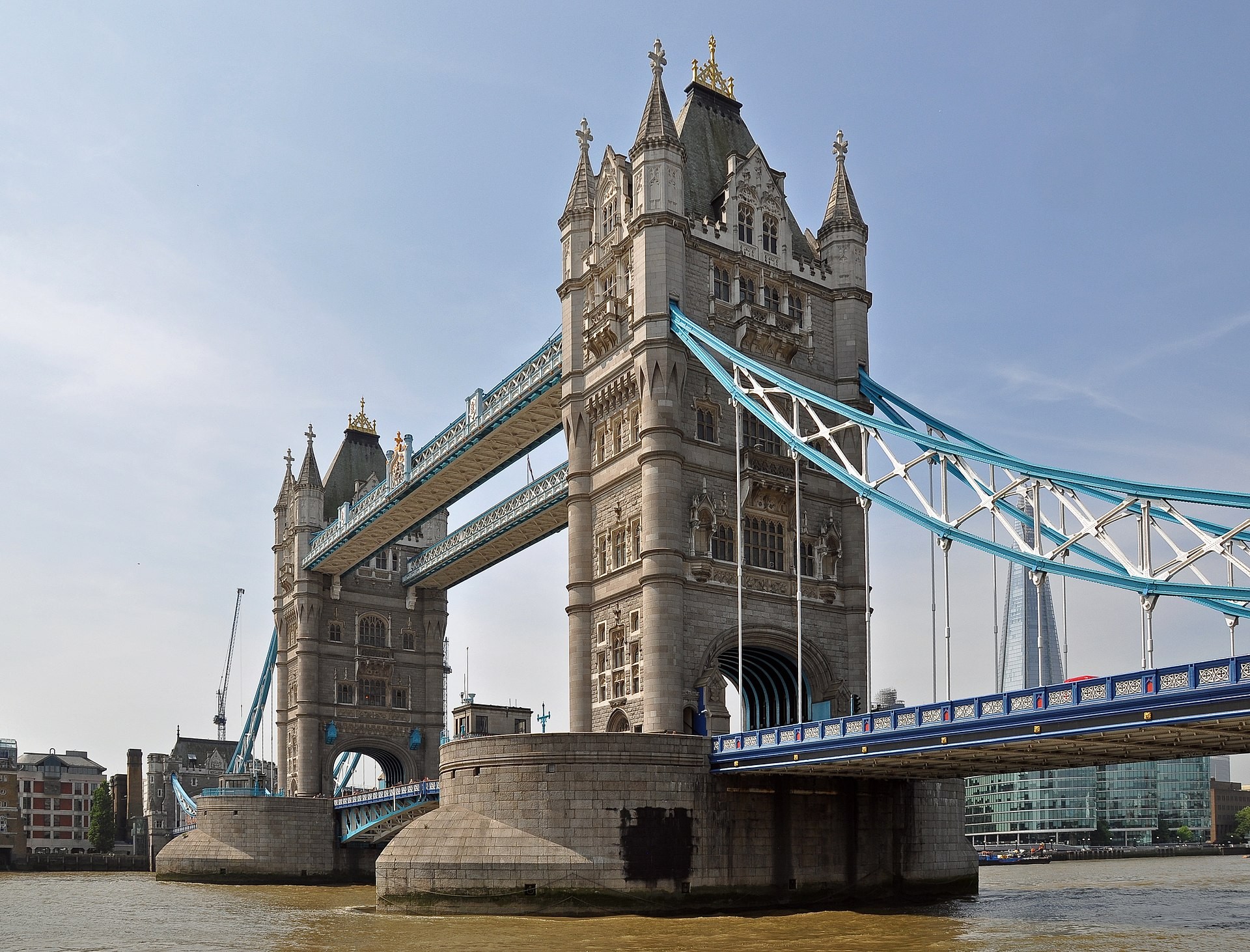 Tower Bridge and its two towers seen from St Katharine Docks, London