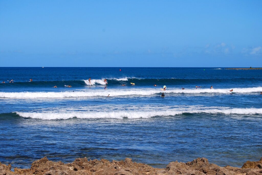 Blue ocean with breaking waves over a reef off Haleiwa on Oahu’s North Shore