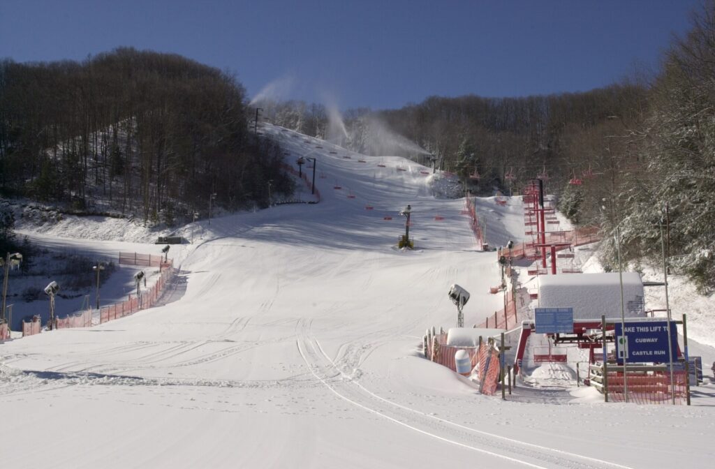 Snow-covered ski slope and lift-area buildings at Ober Gatlinburg in winter