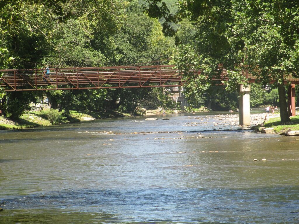 Pedestrian bridge crossing the Oconaluftee River in Cherokee, North Carolina