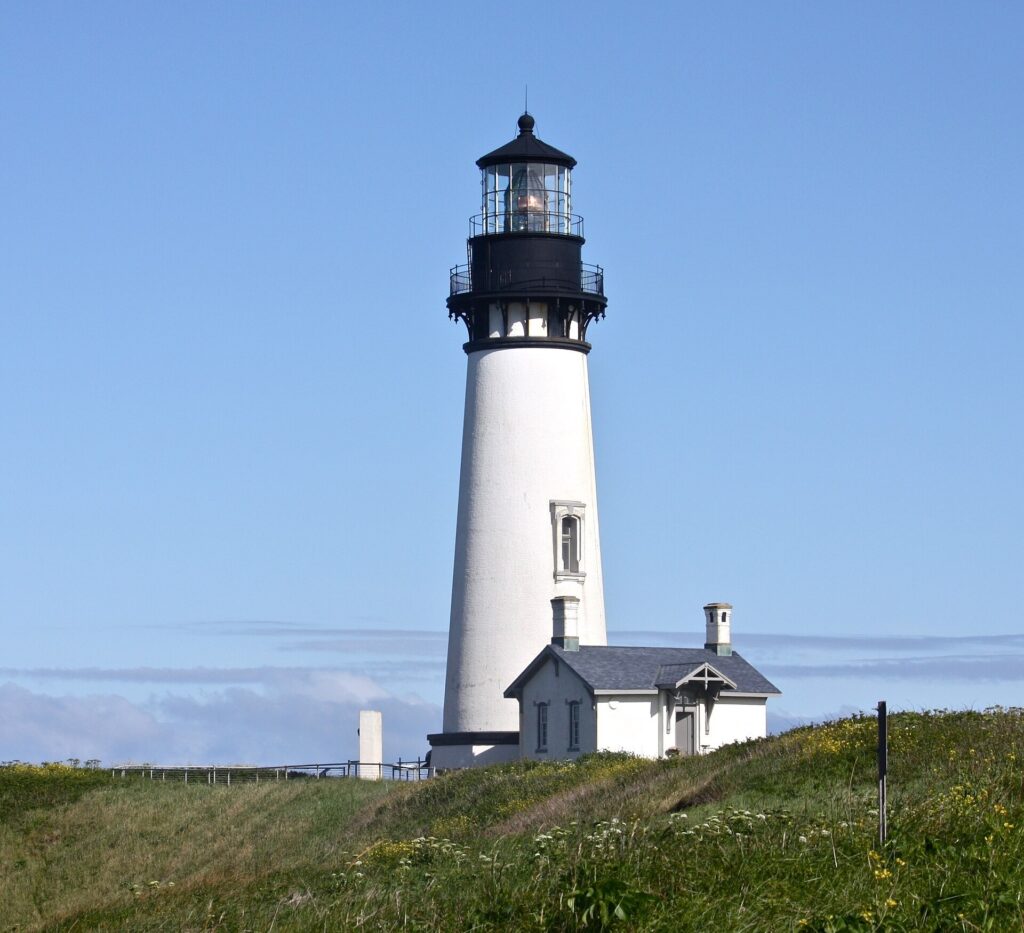 Yaquina Head Lighthouse standing on a grassy headland near Newport, Oregon