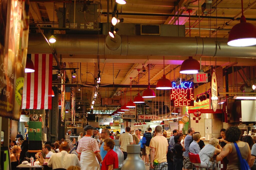 Inside Reading Terminal Market in Philadelphia with stalls and shoppers