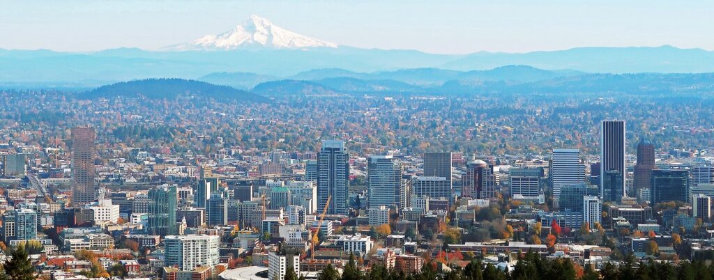 Downtown Portland skyline with Mount Hood on the horizon seen from Pittock Mansion