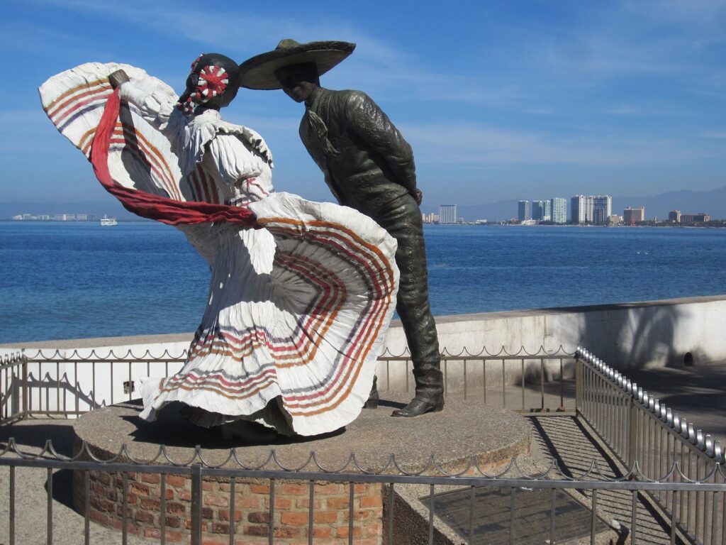 Bronze sculpture of a dancing couple on the Malecón boardwalk in Puerto Vallarta